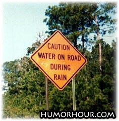 Caution, water on road!